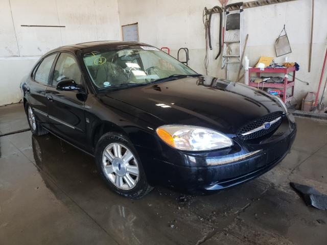 FORD TAURUS SEL 2003 with VIN 1FAHP56S93G100295 - Photo from auction