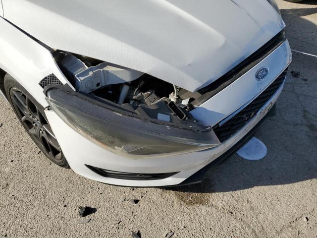 Photo 9 from auction – 2015 FORD FOCUS SE with VIN 1FADP3F21FL264350