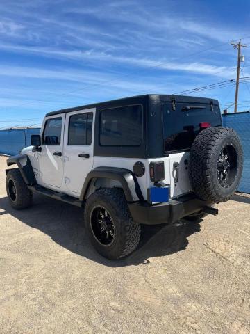 Photo 3 from auction – 2011 JEEP WRANGLER U with VIN 1J4BA3H16BL629634