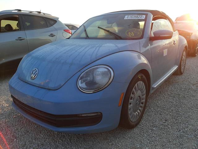 Photo 2 from auction – 2014 VOLKSWAGEN BEETLE with VIN 3VW5X7AT0EM802858