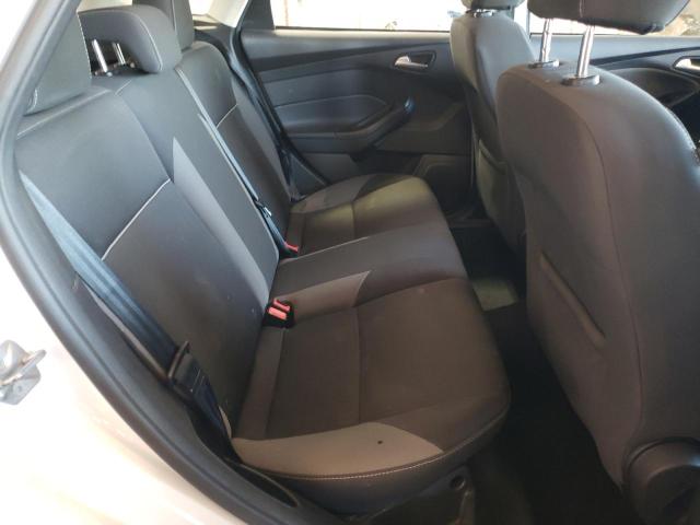 Foto 6 de la subasta – 2014 FORD FOCUS SE con VIN 1FADP3K23EL334158
