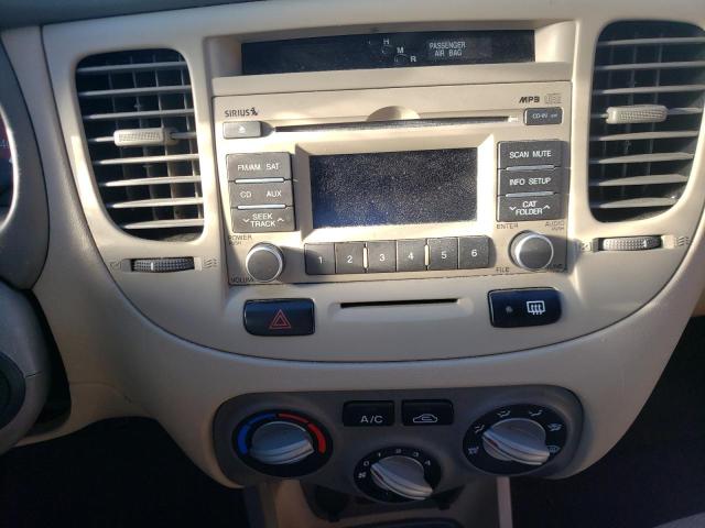 Photo 9 from auction – 2010 KIA RIO LX with VIN KNADH4A38A6610184