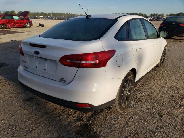 Photo 4 from auction – 2018 FORD FOCUS SE with VIN 1FADP3FE6JL201781