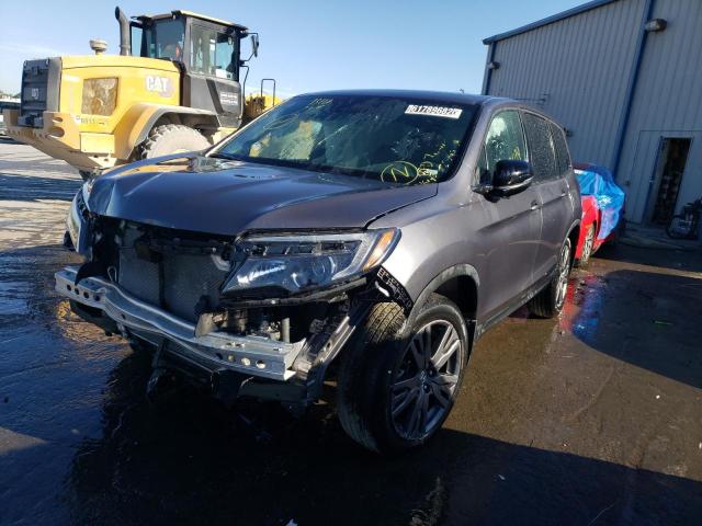 Photo 2 from auction – 2021 HONDA PASSPORT E with VIN 5FNYF7H50MB001795