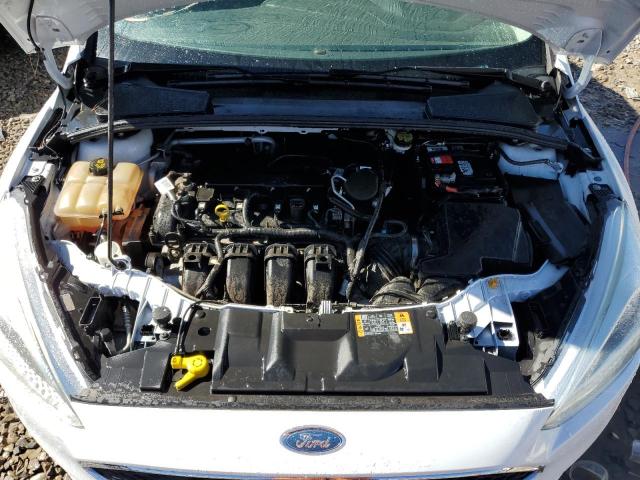 Foto 7 de la subasta – 2016 FORD FOCUS SE con VIN 1FADP3K27GL234275
