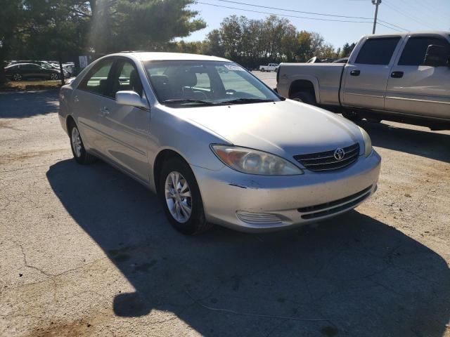 TOYOTA CAMRY LE 2004 with VIN 4T1BF32K14U583003 - Photo from auction