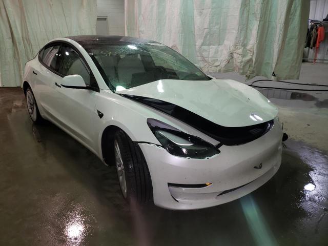 TESLA MODEL 3 2021 with VIN 5YJ3E1EAXMF989776 - Photo from auction