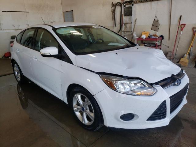 FORD FOCUS SE 2014 with VIN 1FADP3K23EL334158 - Photo from auction