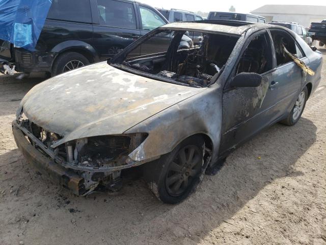 Photo 2 from auction – 2003 TOYOTA CAMRY LE with VIN 4T1BE30K03U671741