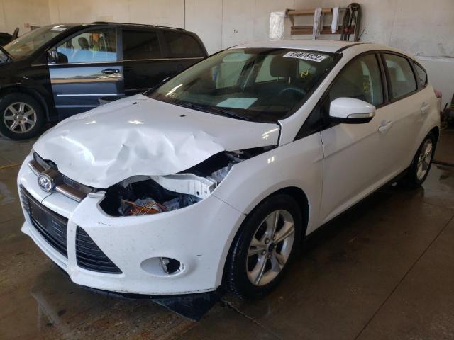 Foto 2 de la subasta – 2014 FORD FOCUS SE con VIN 1FADP3K23EL334158