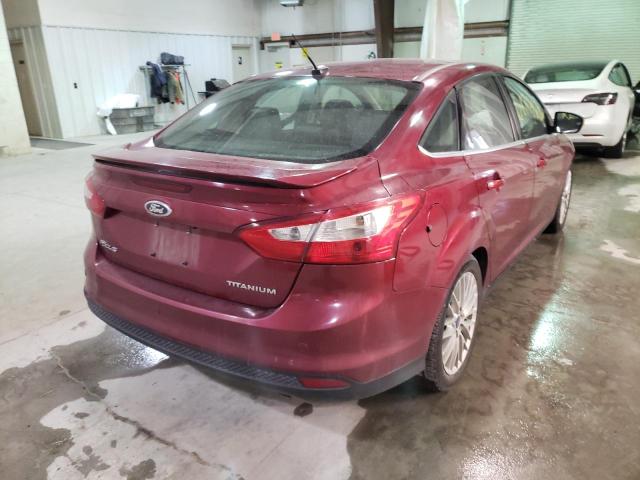Photo 4 from auction – 2014 FORD FOCUS TITA with VIN 1FADP3J25EL160465