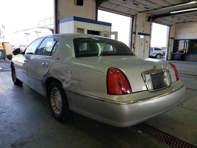 Photo 3 from auction – 2002 LINCOLN TOWN CAR E with VIN 1LNHM81W92Y670302