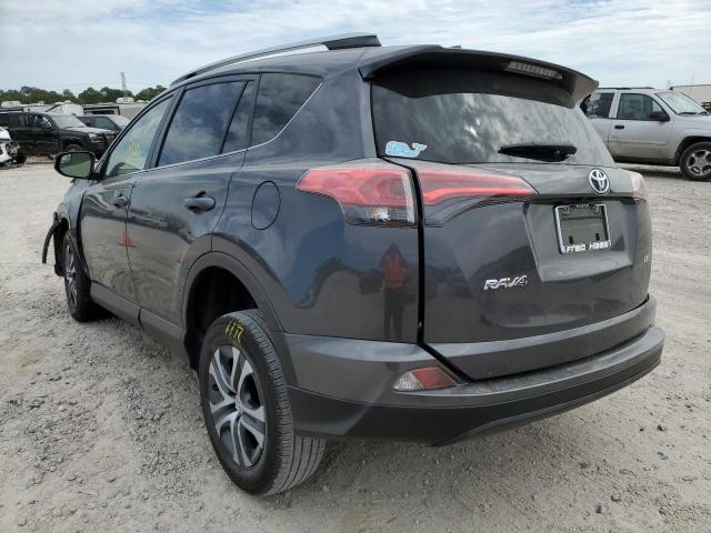 Photo 3 from auction – 2018 TOYOTA RAV4 LE with VIN JTMZFREV2JJ184397