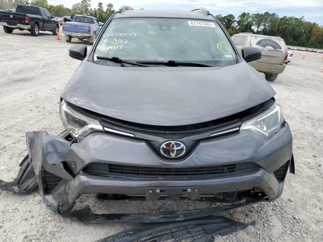 Photo 9 from auction – 2018 TOYOTA RAV4 LE with VIN JTMZFREV2JJ184397