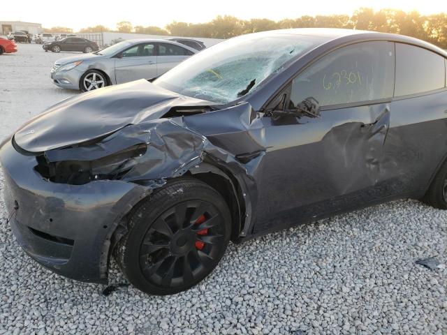 Photo 9 from auction – 2021 TESLA MODEL Y with VIN 5YJYGDEE3MF064759