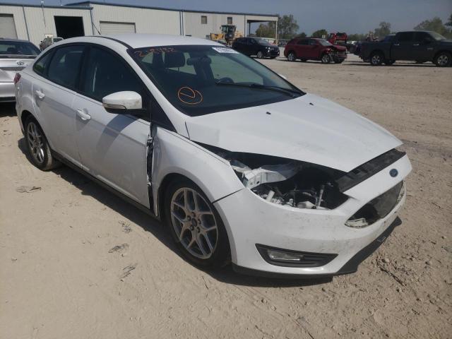 FORD FOCUS SE 2015 with VIN 1FADP3F28FL218482 - Photo from auction