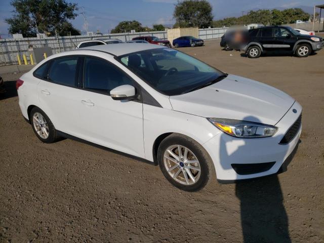 Photo 4 from auction – 2015 FORD FOCUS SE with VIN 1FADP3F24FL249843