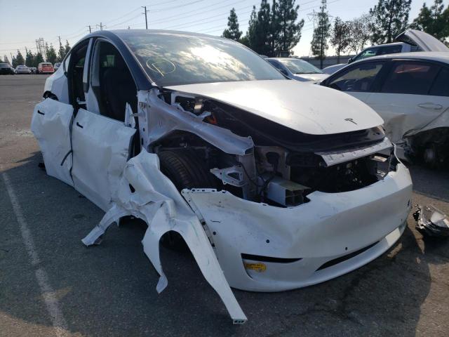 TESLA MODEL Y 2022 with VIN 7SAYGDEF8NF404016 - Photo from auction