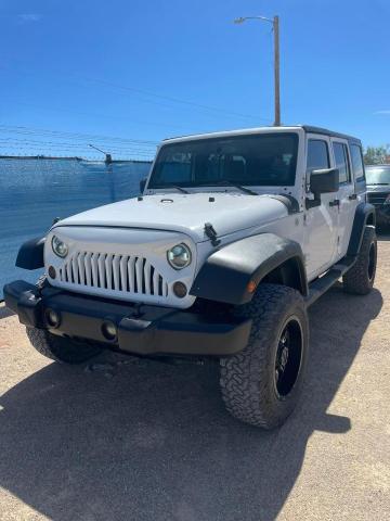 Photo 2 from auction – 2011 JEEP WRANGLER U with VIN 1J4BA3H16BL629634