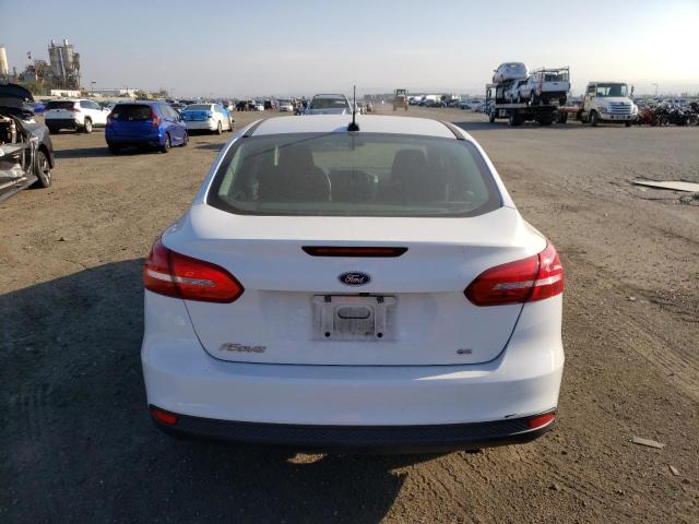 Photo 6 from auction – 2015 FORD FOCUS SE with VIN 1FADP3F24FL249843
