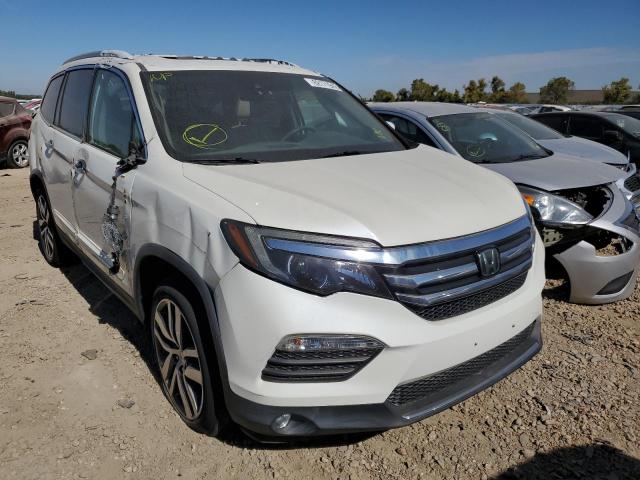 HONDA PILOT TOUR 2016 with VIN 5FNYF6H93GB025817 - Photo from auction