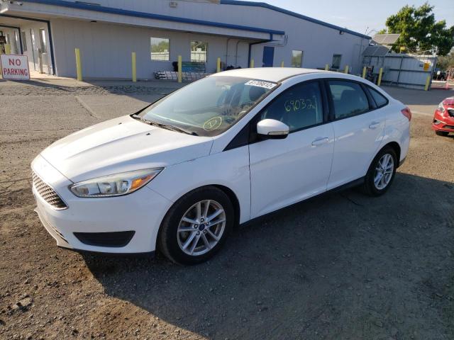 FORD FOCUS SE 2015 with VIN 1FADP3F24FL249843 - Photo from auction