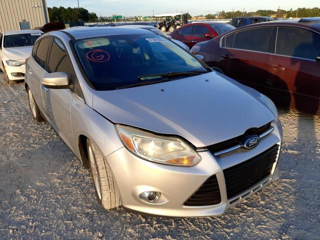 FORD FOCUS SEL 2012 with VIN 1FAHP3M28CL358418 - Photo from auction
