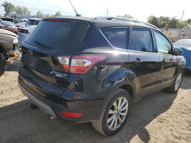 Photo 4 from auction – 2017 FORD ESCAPE TIT with VIN 1FMCU9JD7HUA48991