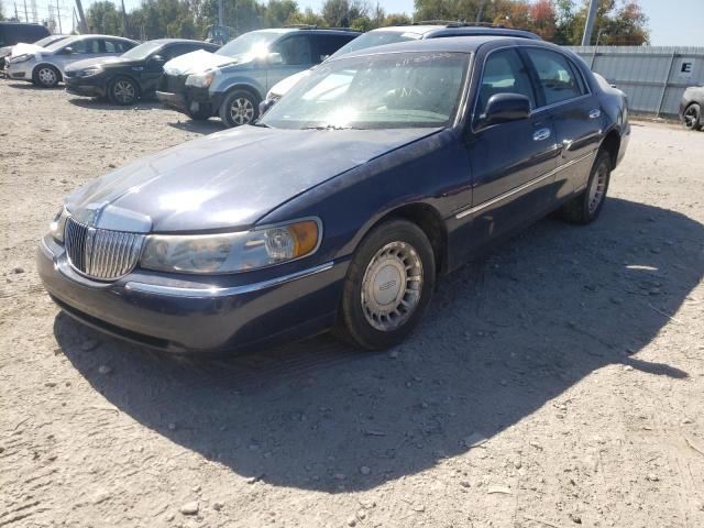 Photo 2 from auction – 2002 LINCOLN TOWN CAR E with VIN 1LNHM81W52Y642898