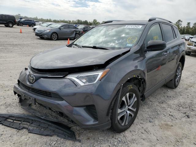 Photo 2 from auction – 2018 TOYOTA RAV4 LE with VIN JTMZFREV2JJ184397