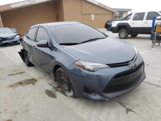 TOYOTA COROLLA L 2018 with VIN 5YFBURHE0JP790473 - Photo from auction