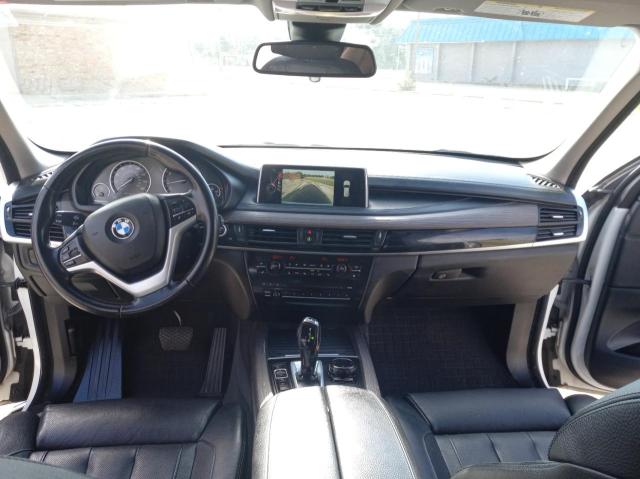 Photo 9 from auction – 2015 BMW X5 XDRIVE5 with VIN 5UXKR6C54F0J75710