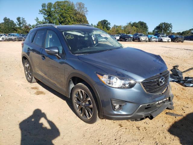 MAZDA CX-5 GT 2016 with VIN JM3KE4DY6G0901571 - Photo from auction