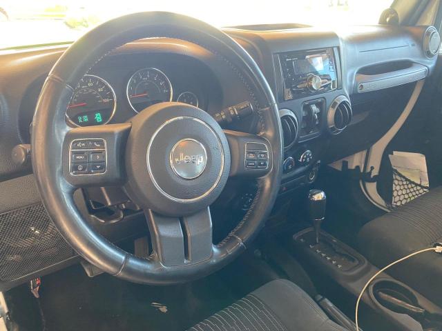 Photo 5 from auction – 2011 JEEP WRANGLER U with VIN 1J4BA3H16BL629634