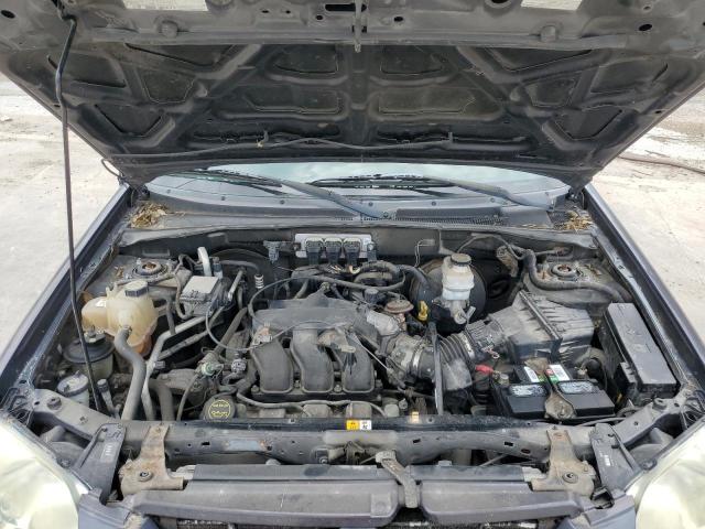 Photo 7 from auction – 2006 MAZDA TRIBUTE S with VIN 4F2YZ04136KM07853