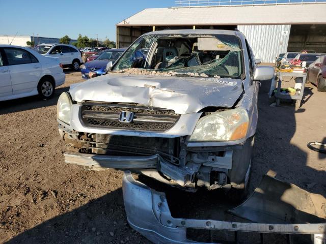 Photo 9 from auction – 2004 HONDA PILOT EX with VIN 2HKYF18454H526518