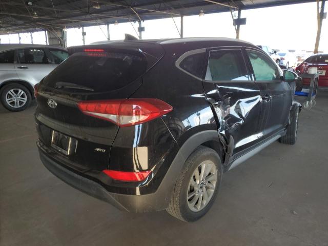 Photo 4 from auction – 2018 HYUNDAI TUCSON SEL with VIN KM8J3CA45JU790075
