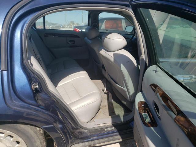 Photo 6 from auction – 2002 LINCOLN TOWN CAR E with VIN 1LNHM81W52Y642898