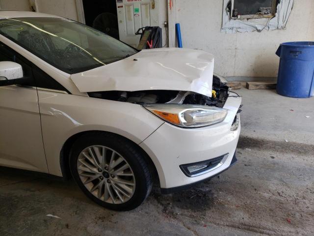Photo 9 from auction – 2015 FORD FOCUS TITA with VIN 1FADP3J23FL340111