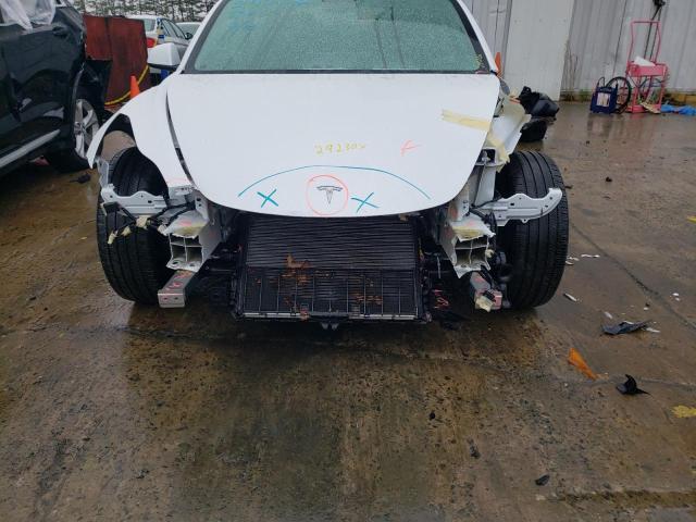 Photo 9 from auction – 2021 TESLA MODEL 3 with VIN 5YJ3E1EAXMF017305