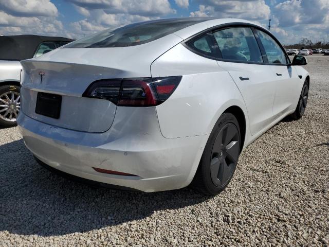 Photo 4 from auction – 2021 TESLA MODEL 3 with VIN 5YJ3E1EA6MF853788