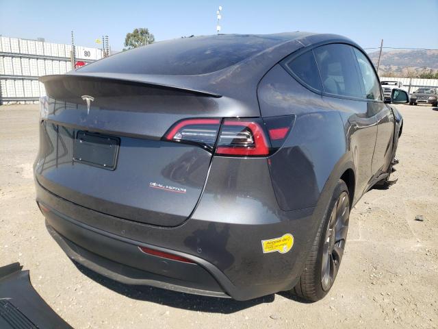 Photo 4 from auction – 2022 TESLA MODEL Y with VIN 7SAYGDEF1NF457429