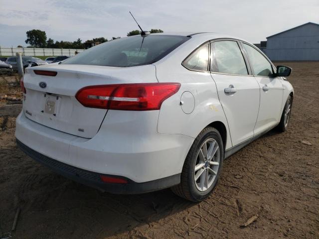 Photo 4 from auction – 2018 FORD FOCUS SE with VIN 1FADP3F2XJL250410
