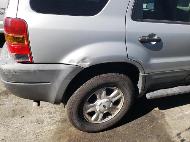 Photo 9 from auction – 2003 FORD ESCAPE XLT with VIN 1FMYU03113KE01850