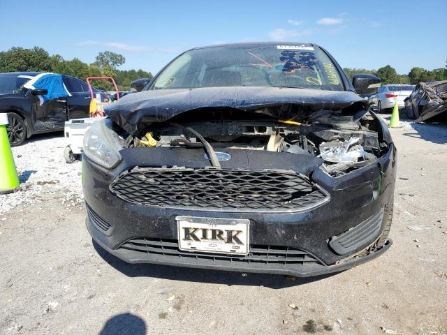 Photo 9 from auction – 2016 FORD FOCUS SE with VIN 1FADP3F25GL255877