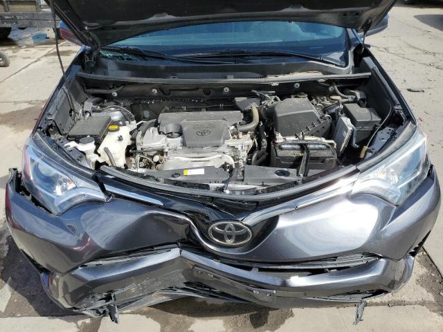 Photo 7 from auction – 2018 TOYOTA RAV4 LE with VIN 2T3BFREV8JW695972