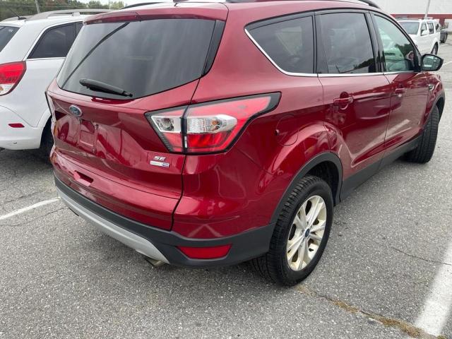 Photo 3 from auction – 2018 FORD ESCAPE SE with VIN 1FMCU9GD6JUA88119