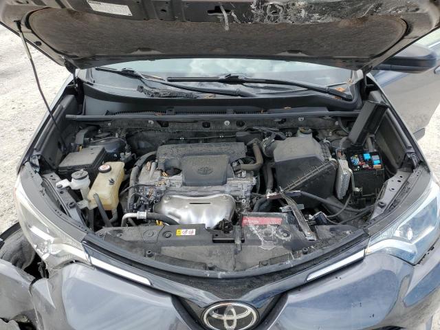 Photo 7 from auction – 2018 TOYOTA RAV4 LE with VIN JTMZFREV2JJ184397