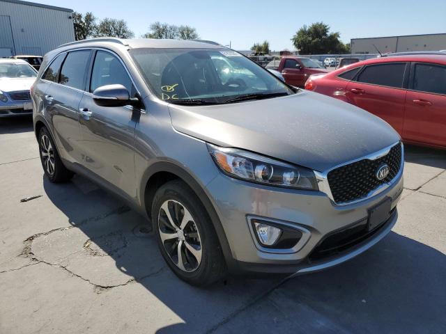 KIA SORENTO EX 2016 with VIN 5XYPH4A14GG184157 - Photo from auction