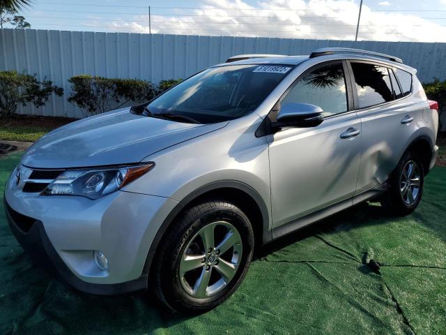 Photo 2 from auction – 2015 TOYOTA RAV4 XLE with VIN JTMWFREV2FJ043971